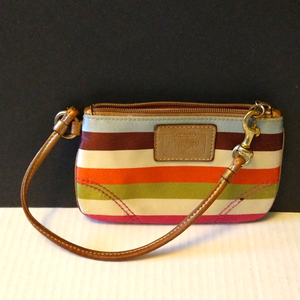 VGUC. Coach striped satin wristlet.